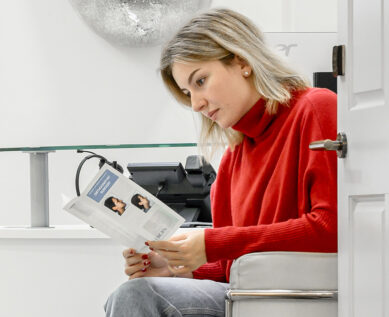 patient looking at leaflet